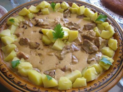 Recette Plat de sauté de porc au brie et aux cèpes