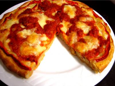 pizza : Pizza au seigle et sa garniture aux artichauts et mozzarella
