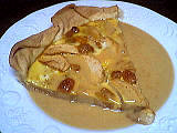 Recette Part de tarte aux pommes et raisins secs