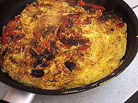 omelette : Omelette aux oignons et au poivron