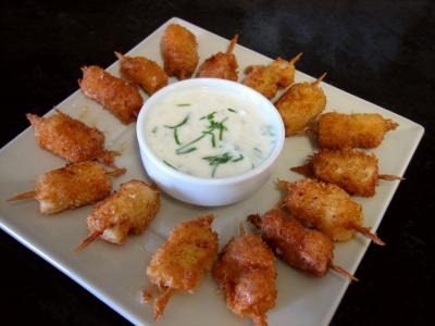 poivre noir : Plat de brochettes de saint-Jacques à la noix de coco